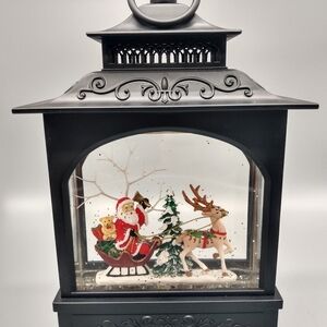 Raz imports black Santa sleigh Christmas snow globe lantern lighted